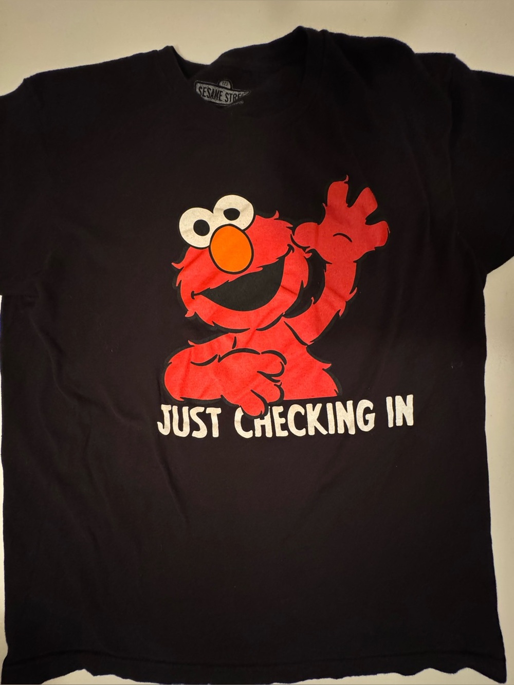 3-$10 T-shirt with Sesame Street print